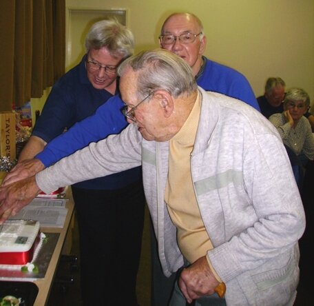 Group Leaders cut the cake